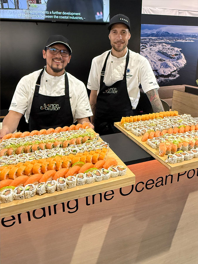 Zuuma serving sushi at Salmon Evolution booth. Photo